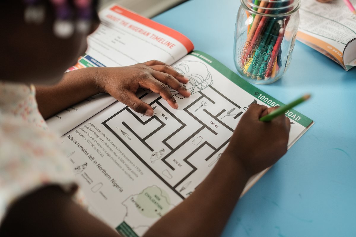 A child working through the Nigerian timeline maze